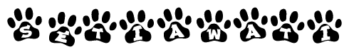 The image shows a series of animal paw prints arranged horizontally. Within each paw print, there's a letter; together they spell Setiawati