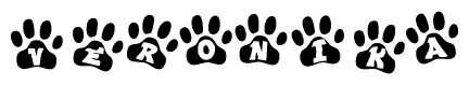 The image shows a series of animal paw prints arranged in a horizontal line. Each paw print contains a letter, and together they spell out the word Veronika.