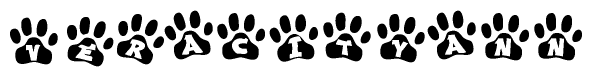 The image shows a row of animal paw prints, each containing a letter. The letters spell out the word Veracityann within the paw prints.