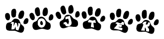 The image shows a series of animal paw prints arranged in a horizontal line. Each paw print contains a letter, and together they spell out the word Wojtek.