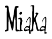 The image is a stylized text or script that reads 'Miaka' in a cursive or calligraphic font.