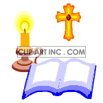 Bible wth candle and cross