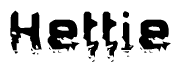 This nametag says Hettie, and has a static looking effect at the bottom of the words. The words are in a stylized font.