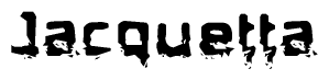 This nametag says Jacquetta, and has a static looking effect at the bottom of the words. The words are in a stylized font.