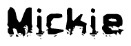 This nametag says Mickie, and has a static looking effect at the bottom of the words. The words are in a stylized font.