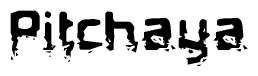This nametag says Pitchaya, and has a static looking effect at the bottom of the words. The words are in a stylized font.