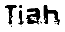 This nametag says Tiah, and has a static looking effect at the bottom of the words. The words are in a stylized font.