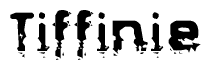   This nametag says Tiffinie, and has a static looking effect at the bottom of the words. The words are in a stylized font. 