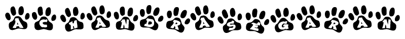 The image shows a row of animal paw prints, each containing a letter. The letters spell out the word Achandrasegaran within the paw prints.