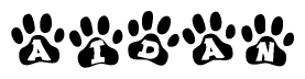 The image shows a row of animal paw prints, each containing a letter. The letters spell out the word Aidan within the paw prints.