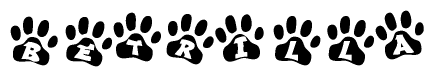 The image shows a row of animal paw prints, each containing a letter. The letters spell out the word Betrilla within the paw prints.