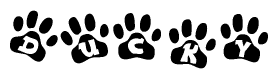 The image shows a row of animal paw prints, each containing a letter. The letters spell out the word Ducky within the paw prints.