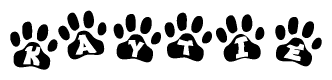 The image shows a series of animal paw prints arranged in a horizontal line. Each paw print contains a letter, and together they spell out the word Kaytie.