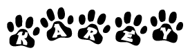 The image shows a row of animal paw prints, each containing a letter. The letters spell out the word Karey within the paw prints.