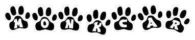 The image shows a series of animal paw prints arranged horizontally. Within each paw print, there's a letter; together they spell Monkcar