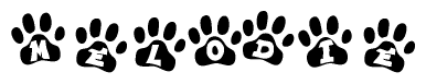 The image shows a row of animal paw prints, each containing a letter. The letters spell out the word Melodie within the paw prints.