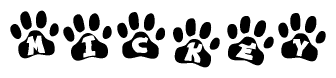 The image shows a row of animal paw prints, each containing a letter. The letters spell out the word Mickey within the paw prints.