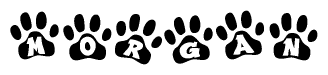 The image shows a series of animal paw prints arranged horizontally. Within each paw print, there's a letter; together they spell Morgan
