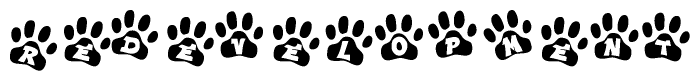 The image shows a series of animal paw prints arranged in a horizontal line. Each paw print contains a letter, and together they spell out the word Redevelopment.