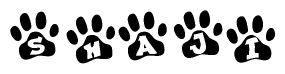The image shows a series of animal paw prints arranged in a horizontal line. Each paw print contains a letter, and together they spell out the word Shaji.