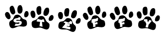 The image shows a series of animal paw prints arranged in a horizontal line. Each paw print contains a letter, and together they spell out the word Steffy.
