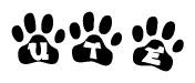 The image shows a row of animal paw prints, each containing a letter. The letters spell out the word Ute within the paw prints.