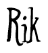 The image contains the word 'Rik' written in a cursive, stylized font.
