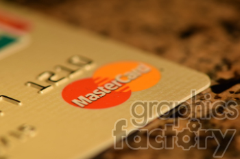 The photo shows the a Mastercard card, a global financial services corporation that provides payment solutions for customers and merchants worldwide. 