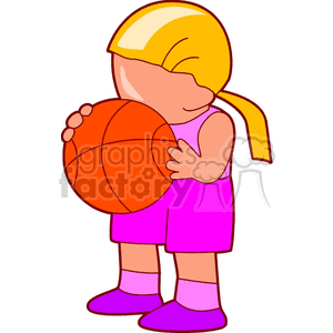 Little girl holding a basketball