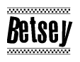 The image contains the text Betsey in a bold, stylized font, with a checkered flag pattern bordering the top and bottom of the text.