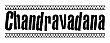 The image contains the text Chandravadana in a bold, stylized font, with a checkered flag pattern bordering the top and bottom of the text.
