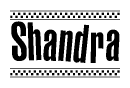 The image contains the text Shandra in a bold, stylized font, with a checkered flag pattern bordering the top and bottom of the text.
