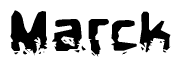 This nametag says Marck, and has a static looking effect at the bottom of the words. The words are in a stylized font.