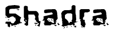 The image contains the word Shadra in a stylized font with a static looking effect at the bottom of the words