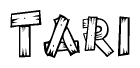 The clipart image shows the name Tari stylized to look as if it has been constructed out of wooden planks or logs. Each letter is designed to resemble pieces of wood.