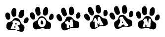 The image shows a series of animal paw prints arranged horizontally. Within each paw print, there's a letter; together they spell Bohman