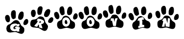 The image shows a series of animal paw prints arranged horizontally. Within each paw print, there's a letter; together they spell Groovin