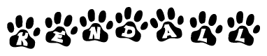The image shows a row of animal paw prints, each containing a letter. The letters spell out the word Kendall within the paw prints.