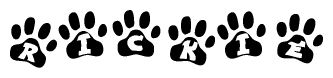 The image shows a series of animal paw prints arranged horizontally. Within each paw print, there's a letter; together they spell Rickie