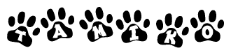 The image shows a row of animal paw prints, each containing a letter. The letters spell out the word Tamiko within the paw prints.