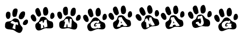 The image shows a series of animal paw prints arranged horizontally. Within each paw print, there's a letter; together they spell Thngamajg