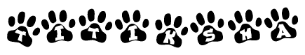 The image shows a series of animal paw prints arranged in a horizontal line. Each paw print contains a letter, and together they spell out the word Titiksha.