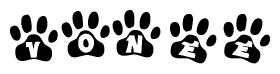 The image shows a row of animal paw prints, each containing a letter. The letters spell out the word Vonee within the paw prints.
