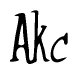 The image is of the word Akc stylized in a cursive script.