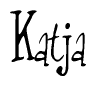 The image is a stylized text or script that reads 'Katja' in a cursive or calligraphic font.