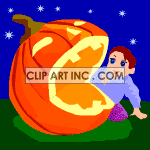 Animated halloween pumkin with a wide mouth and a little boy looking in