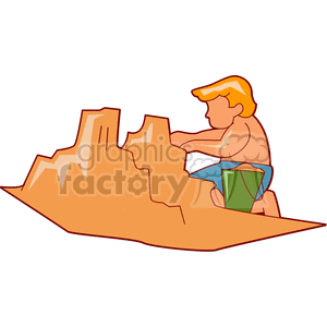 Litttle boy building a sandcastle