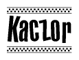 The image contains the text Kaczor in a bold, stylized font, with a checkered flag pattern bordering the top and bottom of the text.