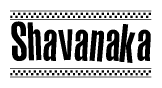 The image contains the text Shavanaka in a bold, stylized font, with a checkered flag pattern bordering the top and bottom of the text.