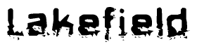 The image contains the word Lakefield in a stylized font with a static looking effect at the bottom of the words